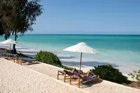 Relaxing on the beach on luxury safari in Kenya